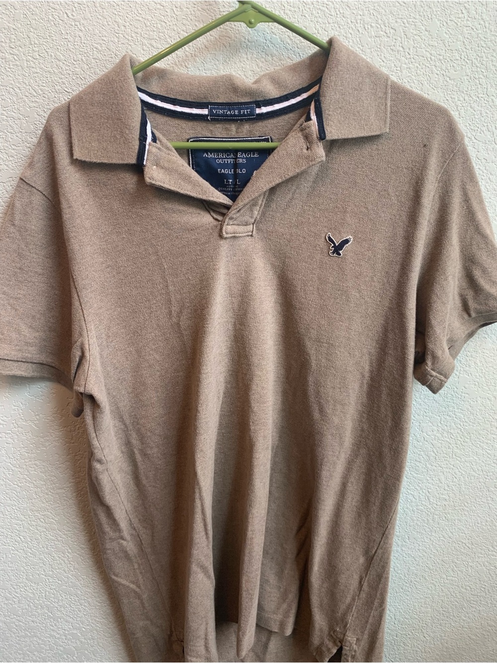 American Eagle Outfitters Tan Polo with Navy Eagle Logo